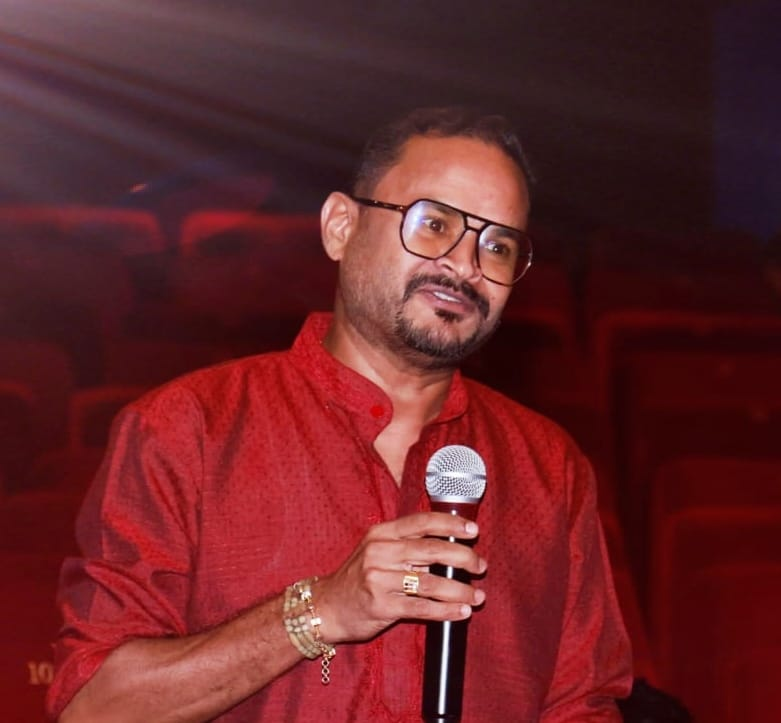 Portrait of Sanooj Naringaparambil in a farm setting